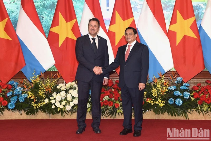 Thủ tướng Phạm Minh Chính và Thủ tướng Đại Công quốc Luxembourg Xavier Bettel. (Ảnh: TRẦN HẢI)